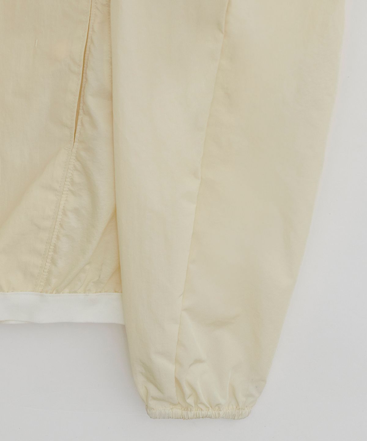 이이(EE) DETACHABLE WINDBREAKER LEMON