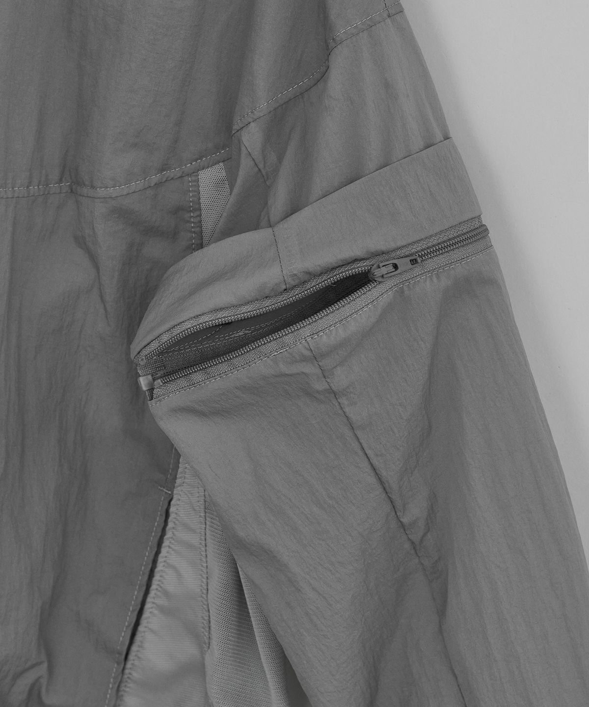 이이(EE) WOMENS DETACHABLE WINDBREAKER GREY