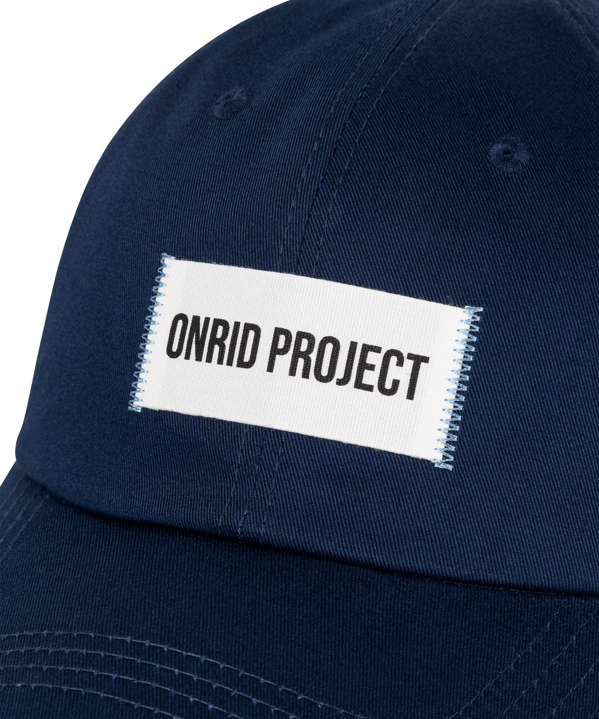 온리드프로젝트(ONRIDPROJECT) 로고 라벨 볼캡 - 네이비