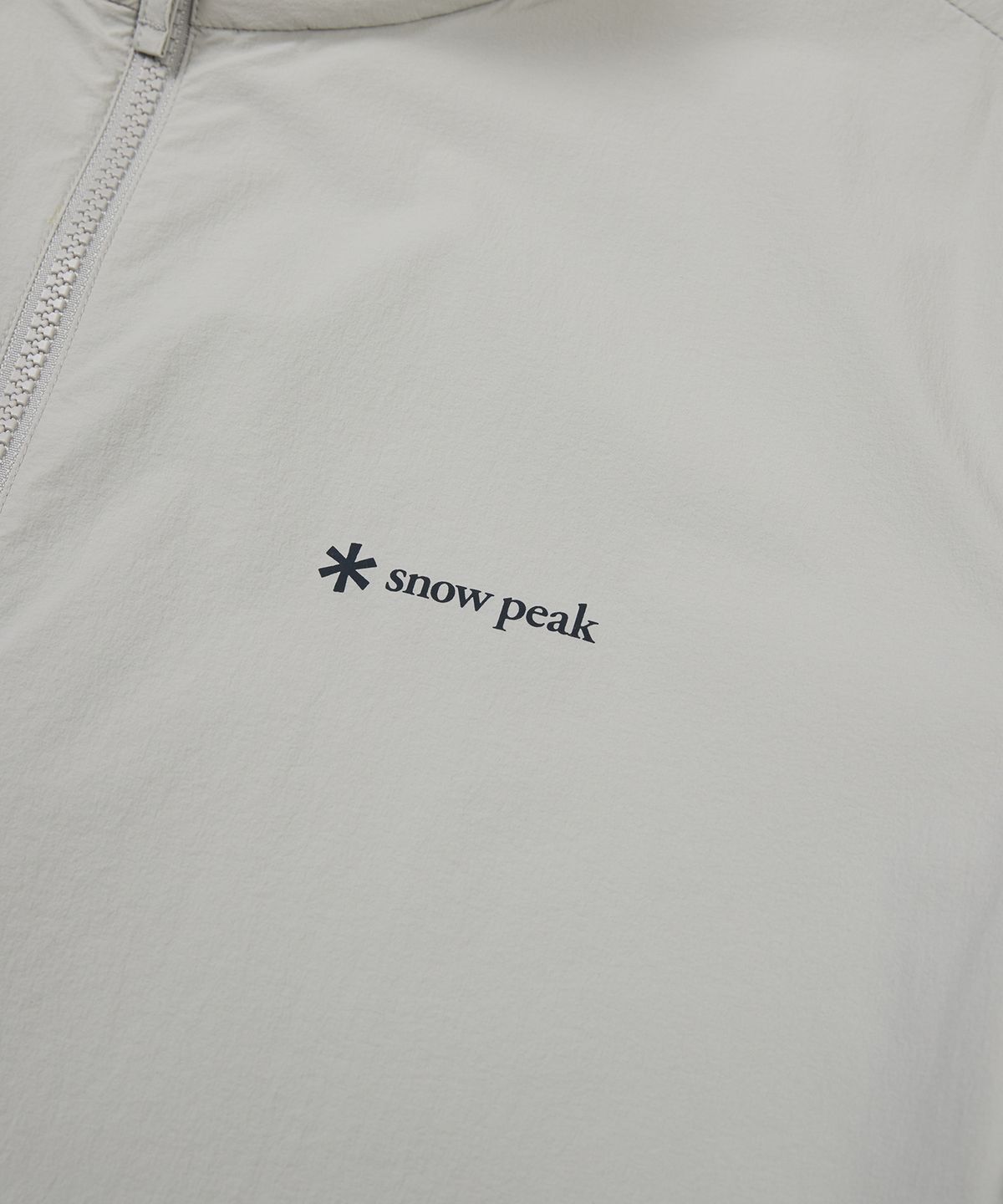 스노우피크 어패럴(SNOWPEAK APPAREL) 씬테크 우븐 스탠드넥 반팔 아노락 Light Gray (S24MMSAN34)