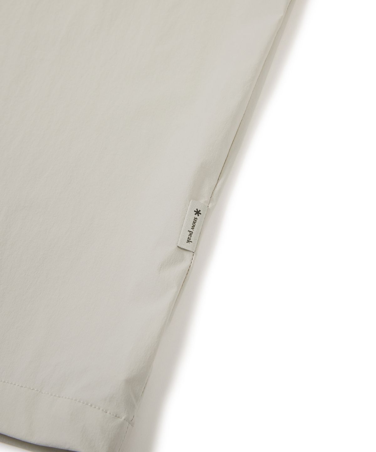 스노우피크 어패럴(SNOWPEAK APPAREL) 씬테크 여성 우븐 스탠드넥 반팔 아노락 Light Beige (S24MWSAN35)