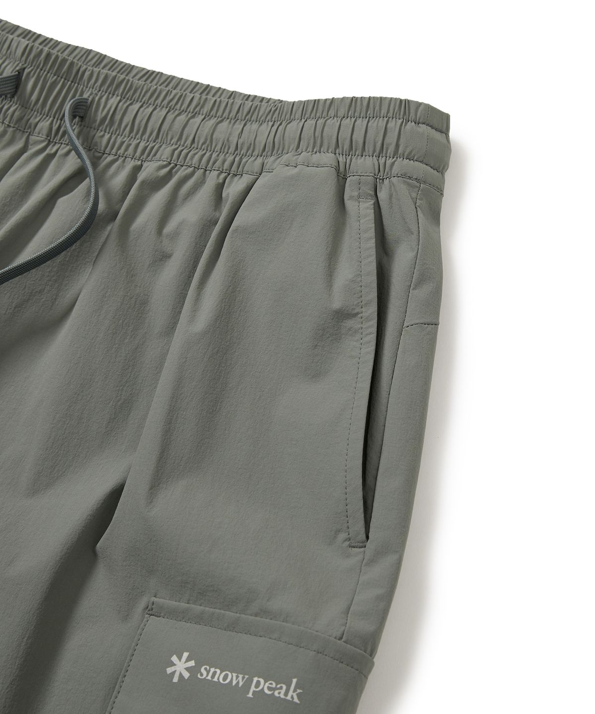 스노우피크 어패럴(SNOWPEAK APPAREL) 씬테크 우븐 카고 반바지 Light Khaki (S24MUSHP62)