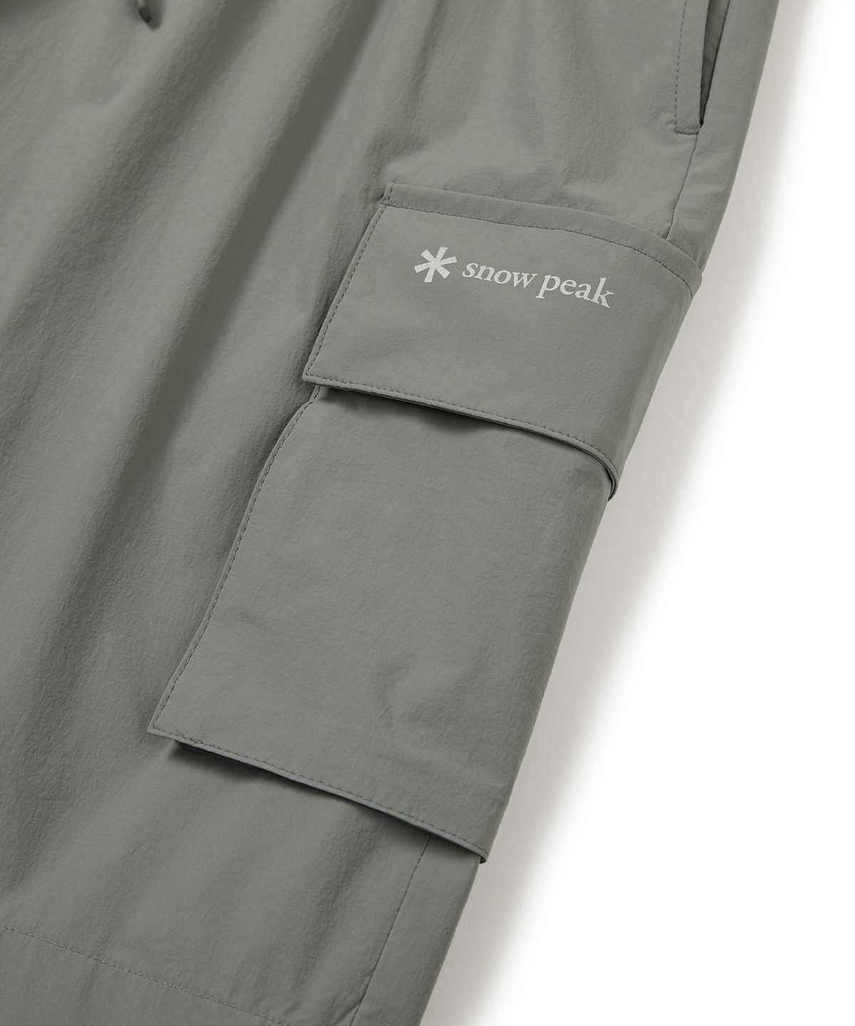 스노우피크 어패럴(SNOWPEAK APPAREL) 씬테크 우븐 카고 반바지 Light Khaki (S24MUSHP62)