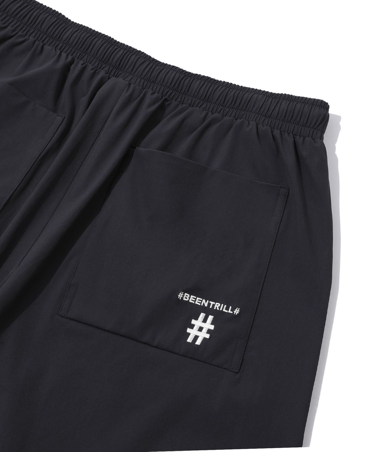 빈트릴(BEENTRILL) 스탠드 카라 아노락 우븐 셋업 와이드핏 쇼츠(다크 차콜)