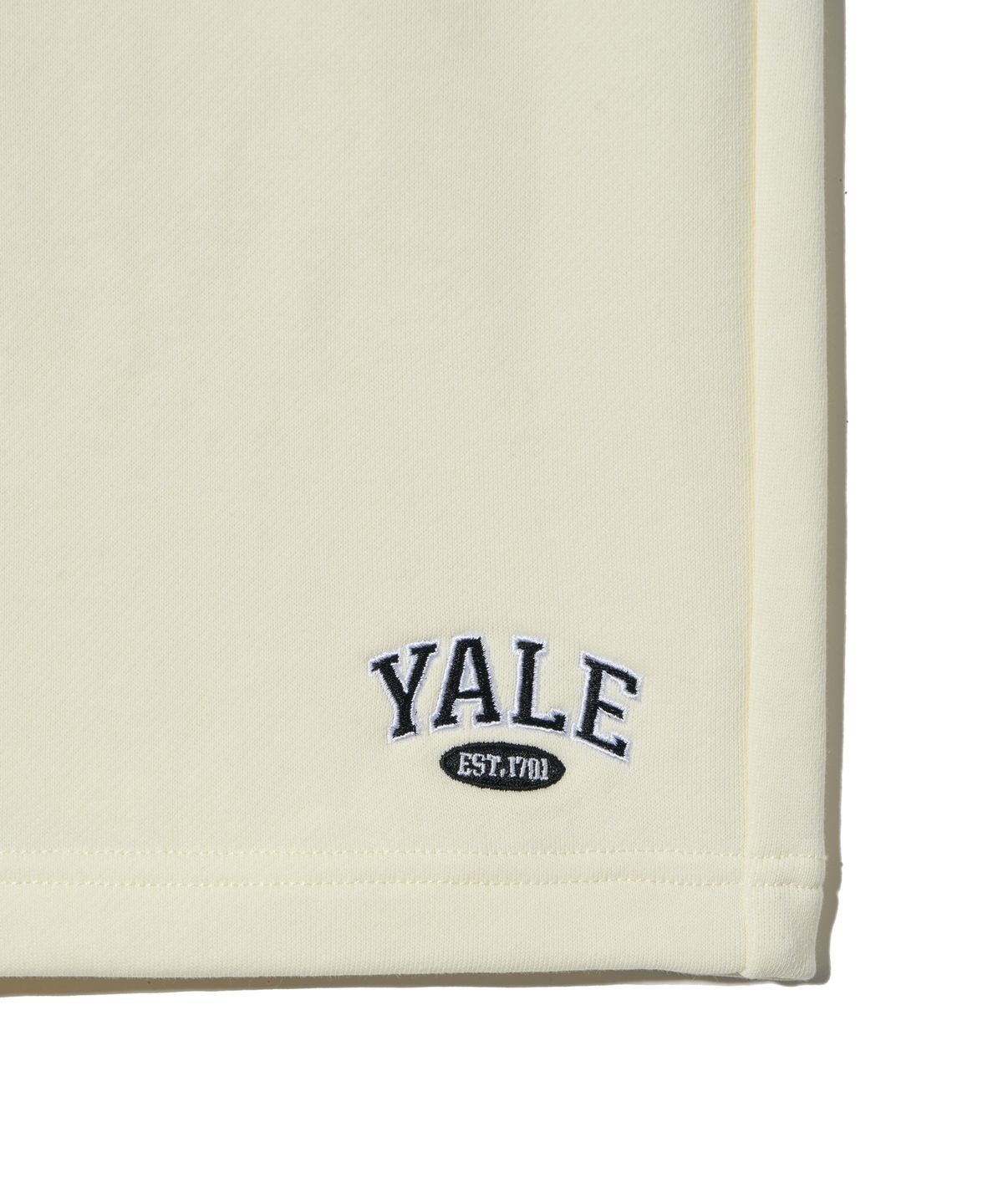 예일(YALE) SMALL 2 TONE ARCH SWEAT SHORTS CREAM