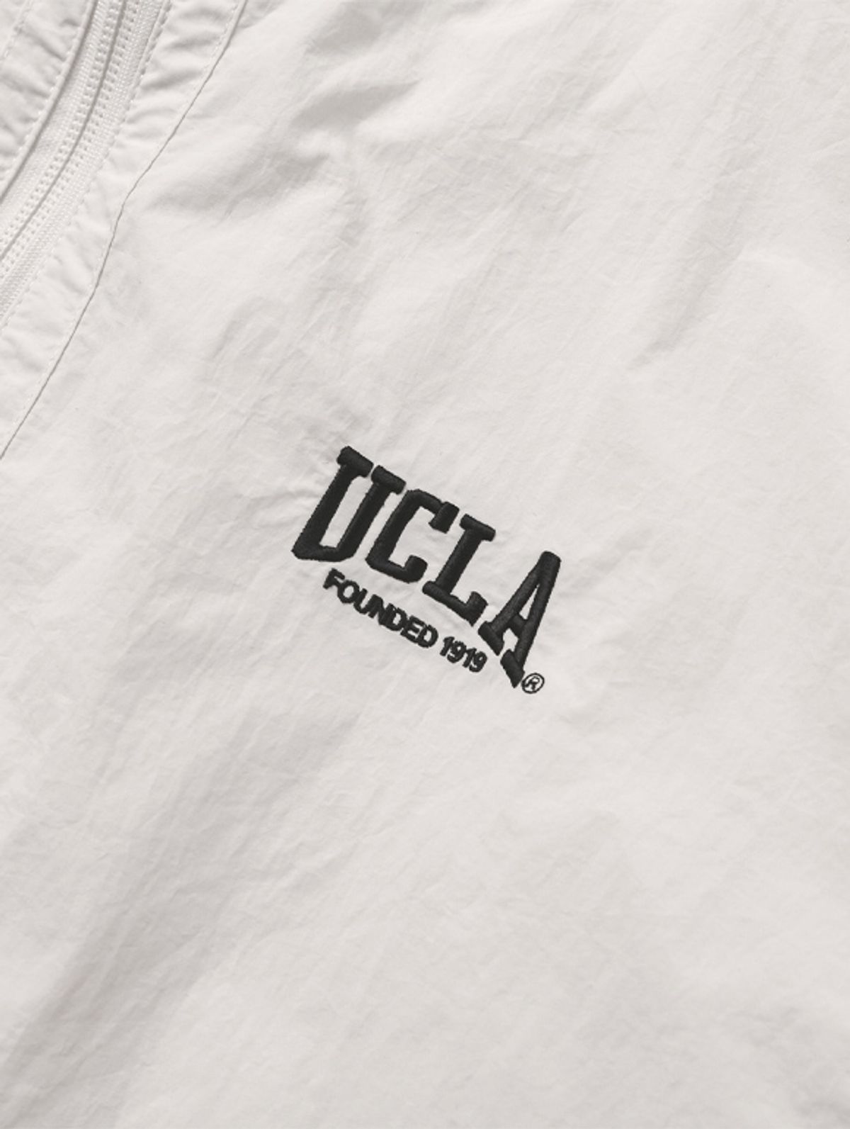 유씨엘에이(UCLA) 남녀공용 경량 후드집업 윈드브레이크[O-WHITE](UA3UJ99_33)