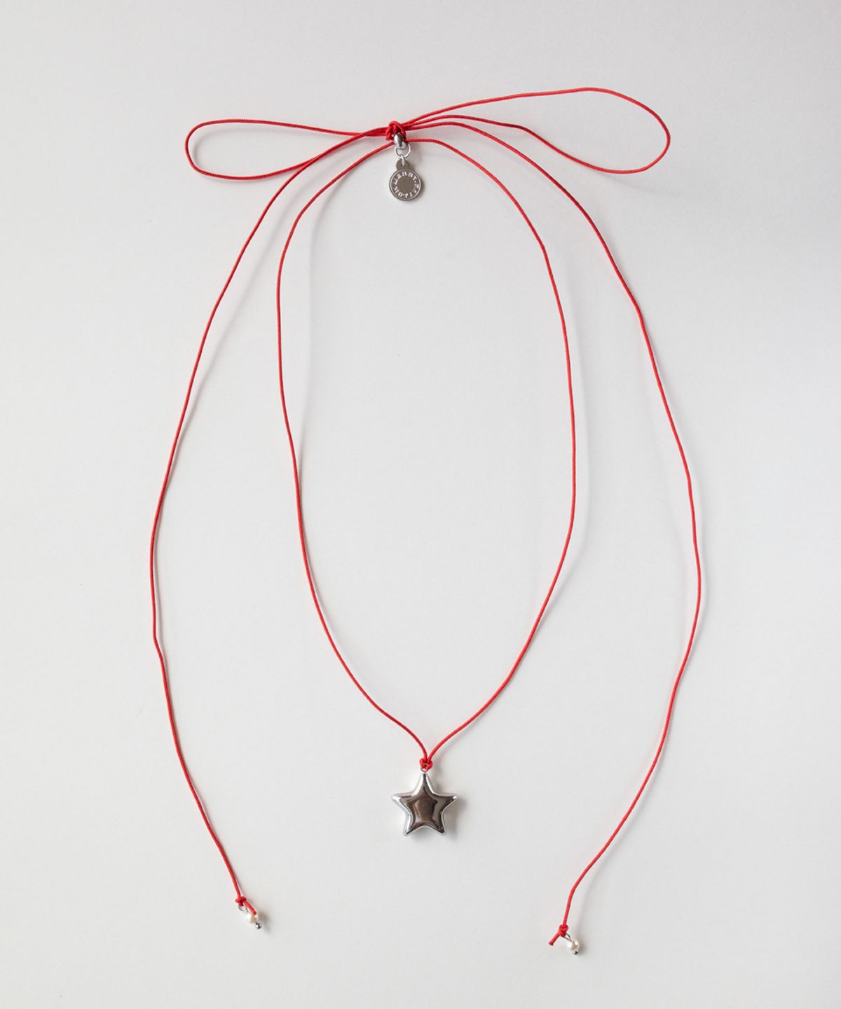 메리모티브(MERRYMOTIVE) Star with red string necklace
