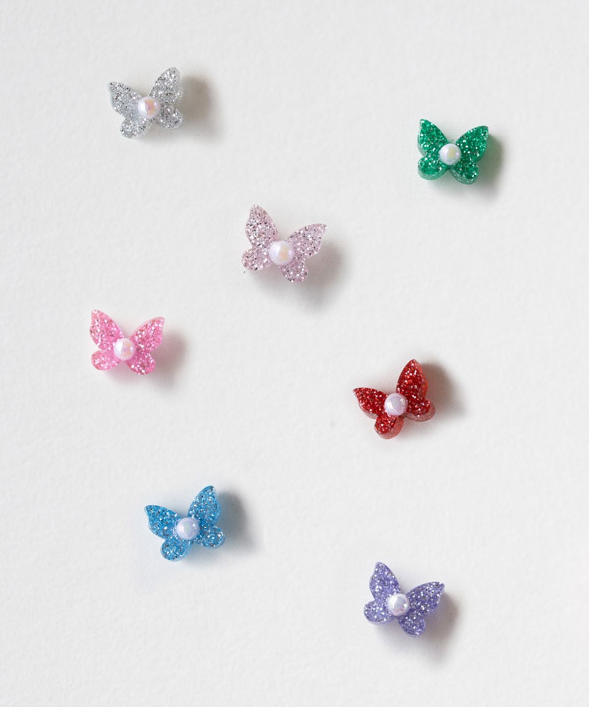 메리모티브(MERRYMOTIVE) Shining pearly butterfly earring (7color)