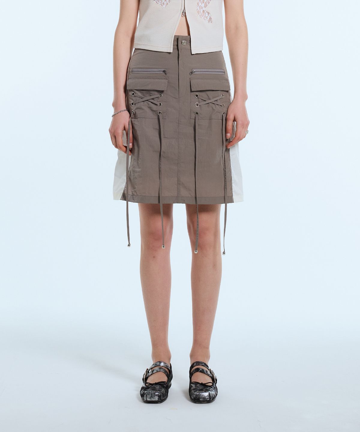 라티젠(LARTIGENT) L11 EYELET NYLON SKIRT(BROWN)