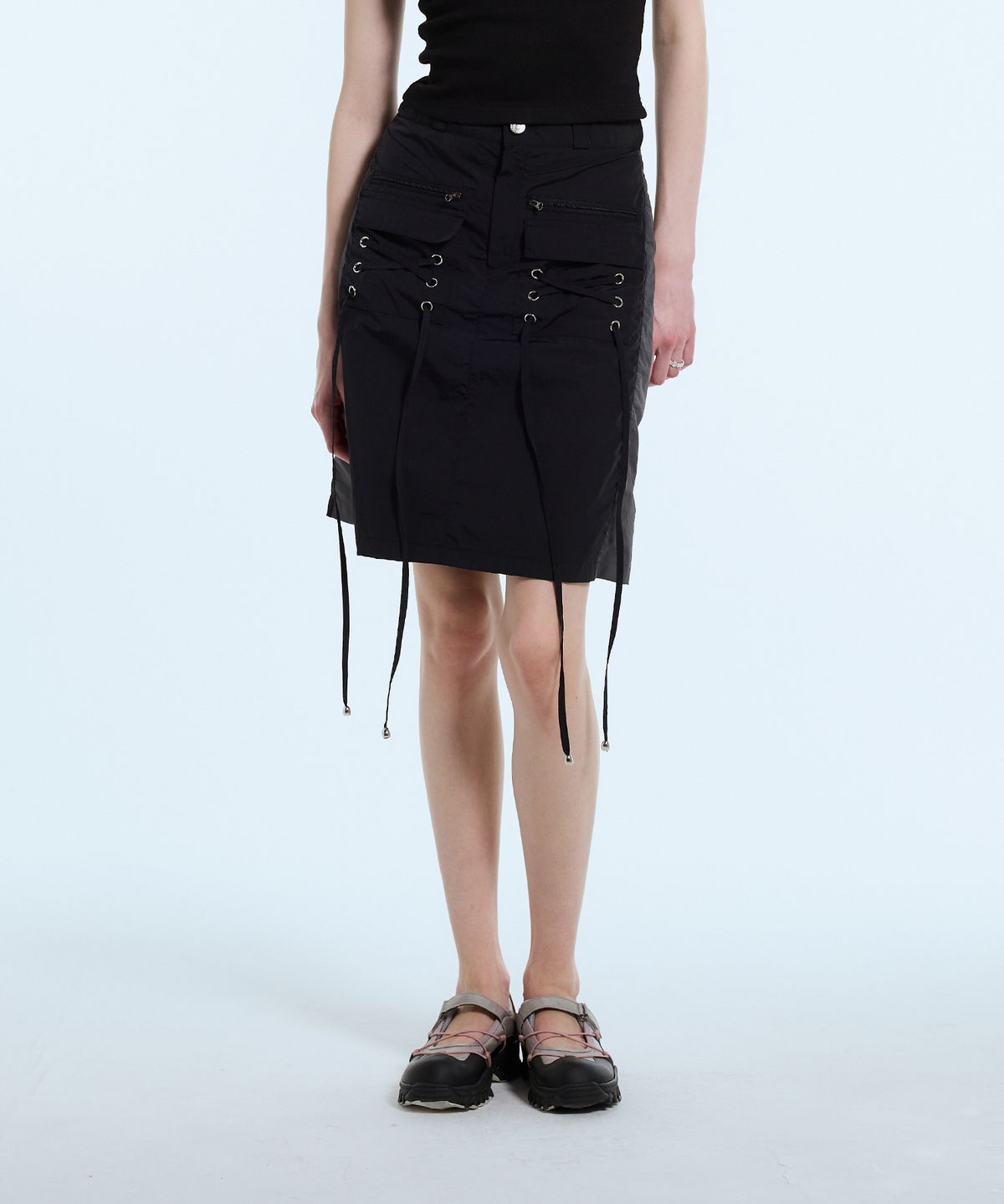 라티젠(LARTIGENT) L11 EYELET NYLON SKIRT(BLACK)