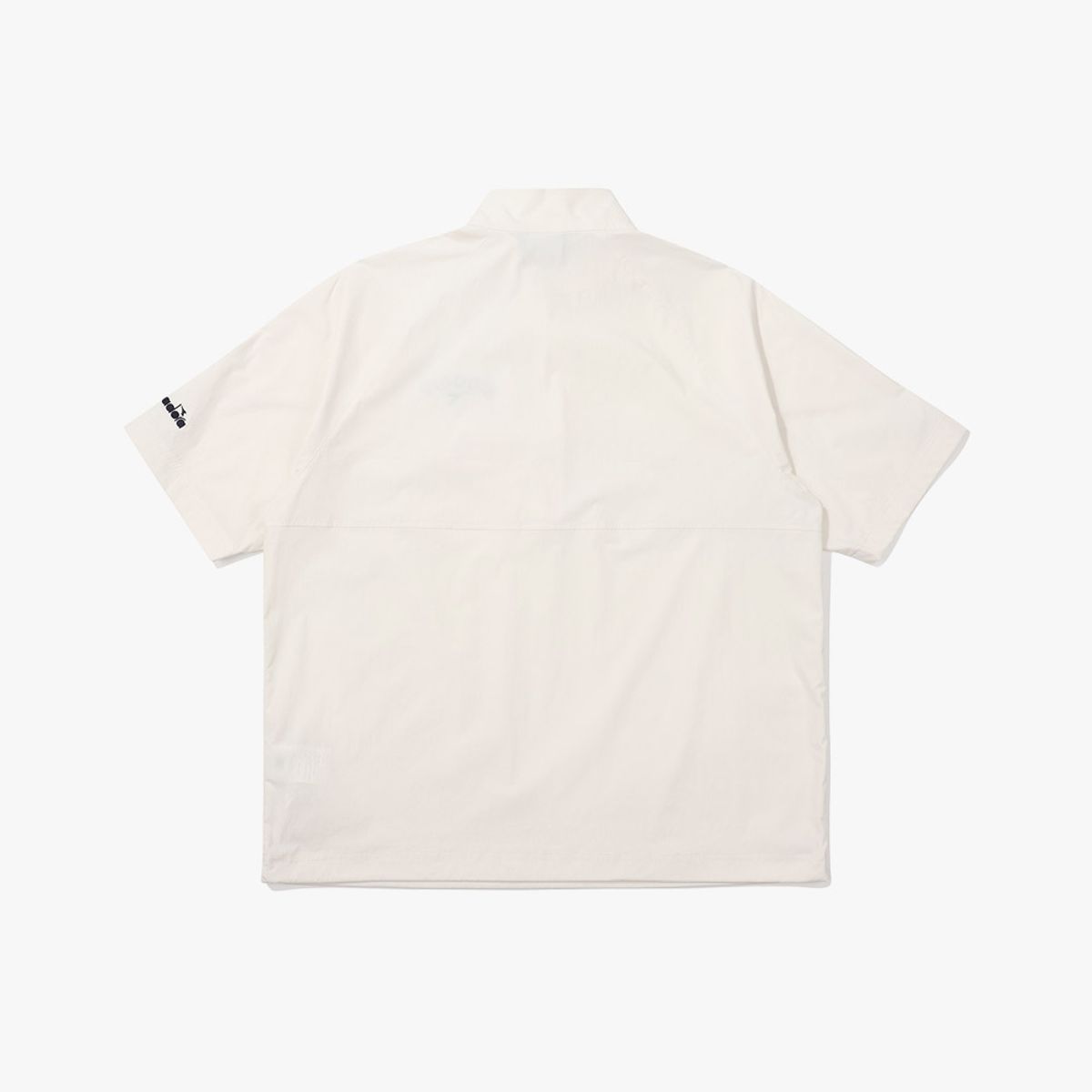 디아도라(diadora) 컴피 우븐 반팔 아노락 IVORY