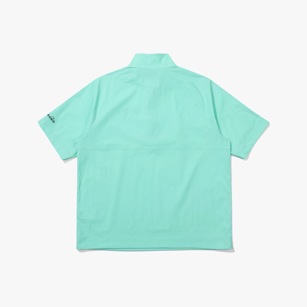디아도라(diadora) 컴피 우븐 반팔 아노락 MINT
