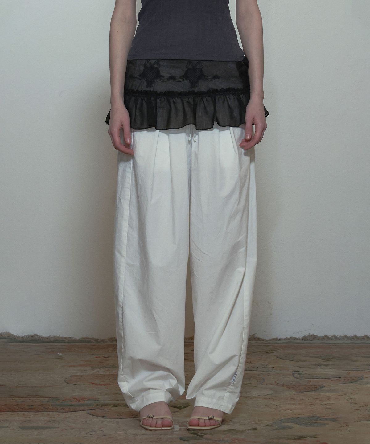 스컬프터(SCULPTOR) Peekaboo Micro Sheer Skirt Black Sheer