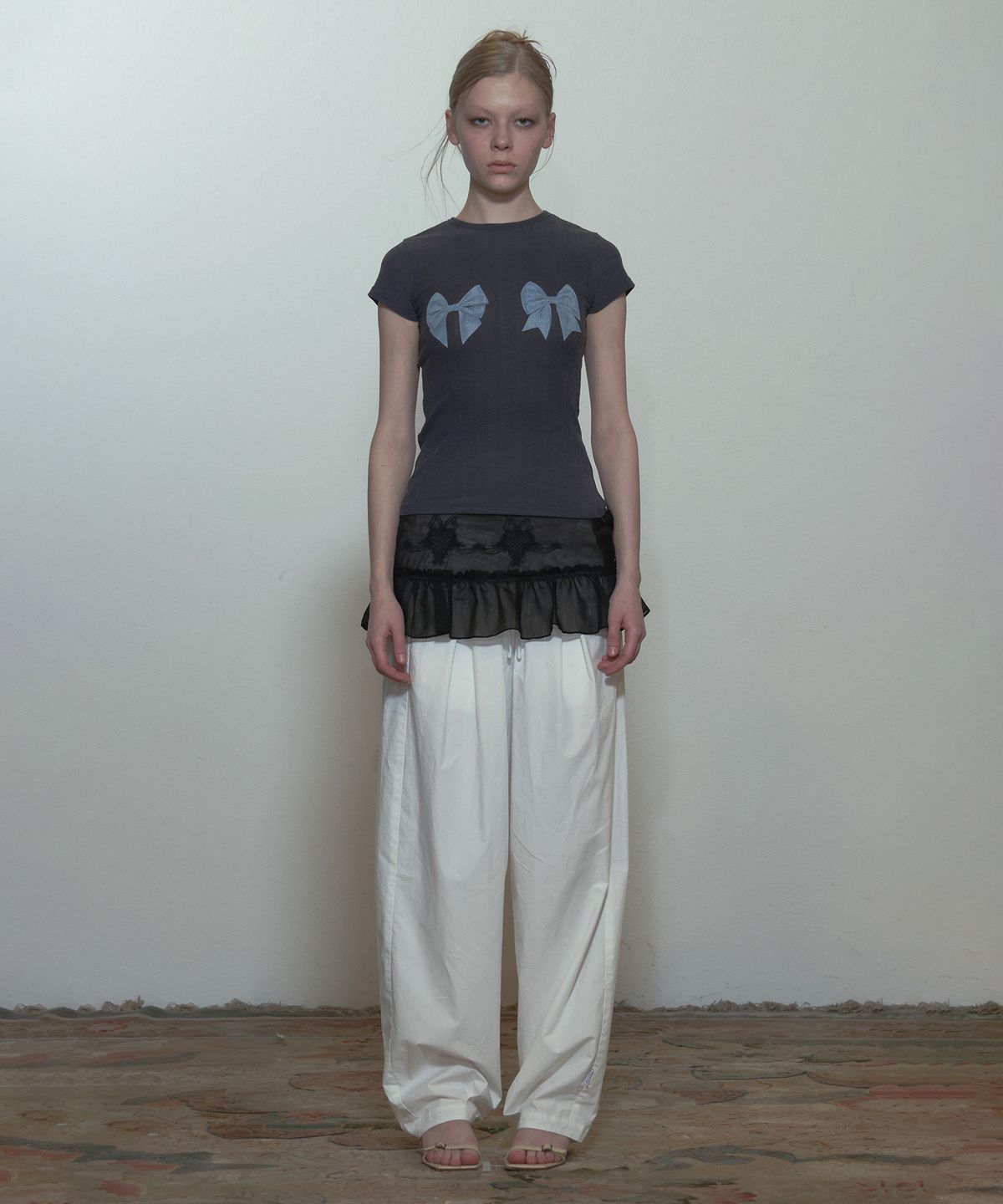 스컬프터(SCULPTOR) Peekaboo Micro Sheer Skirt Black Sheer