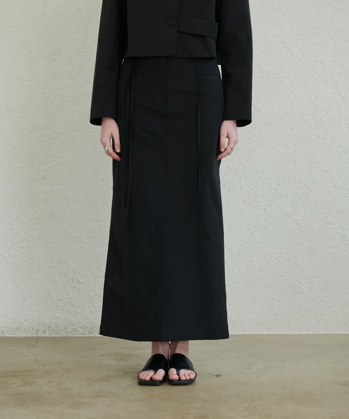 언뮤트(UNMUTE) BELT LOOP STRING PENCIL SKIRT(BLACK)