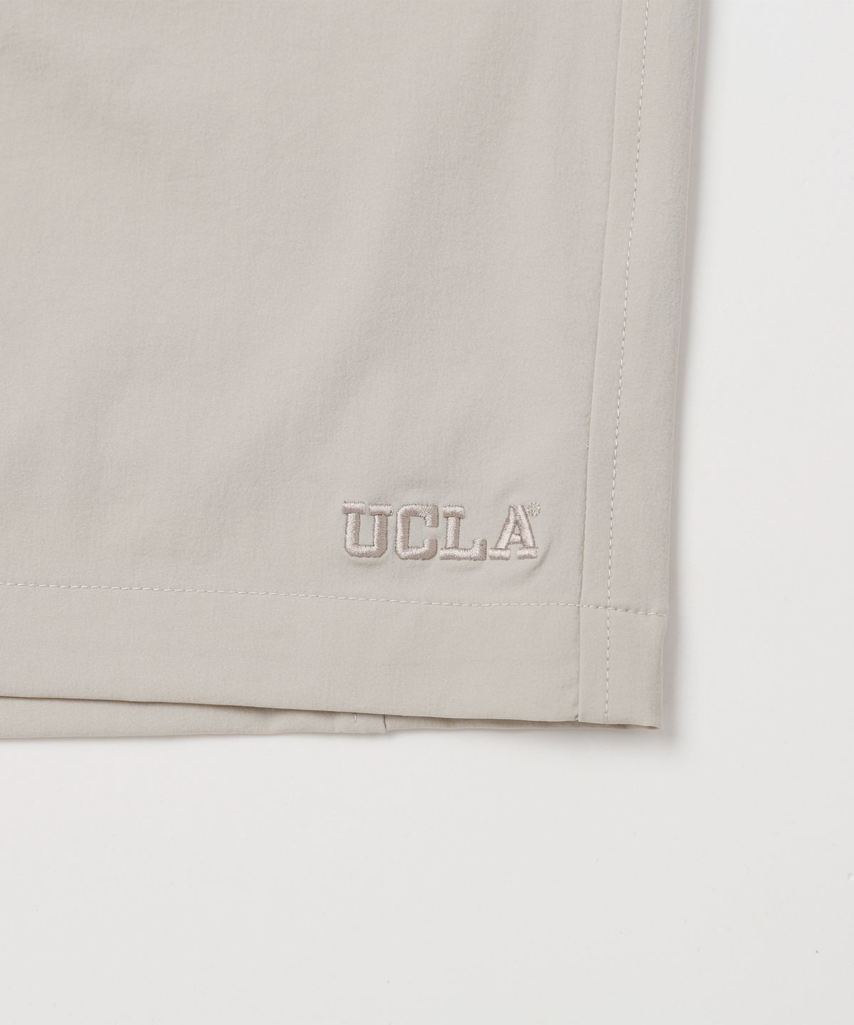 유씨엘에이(UCLA) 남녀공용 나일론 스판 풀밴딩 4부 팬츠[LT-BEIGE](UA4SP95_23)