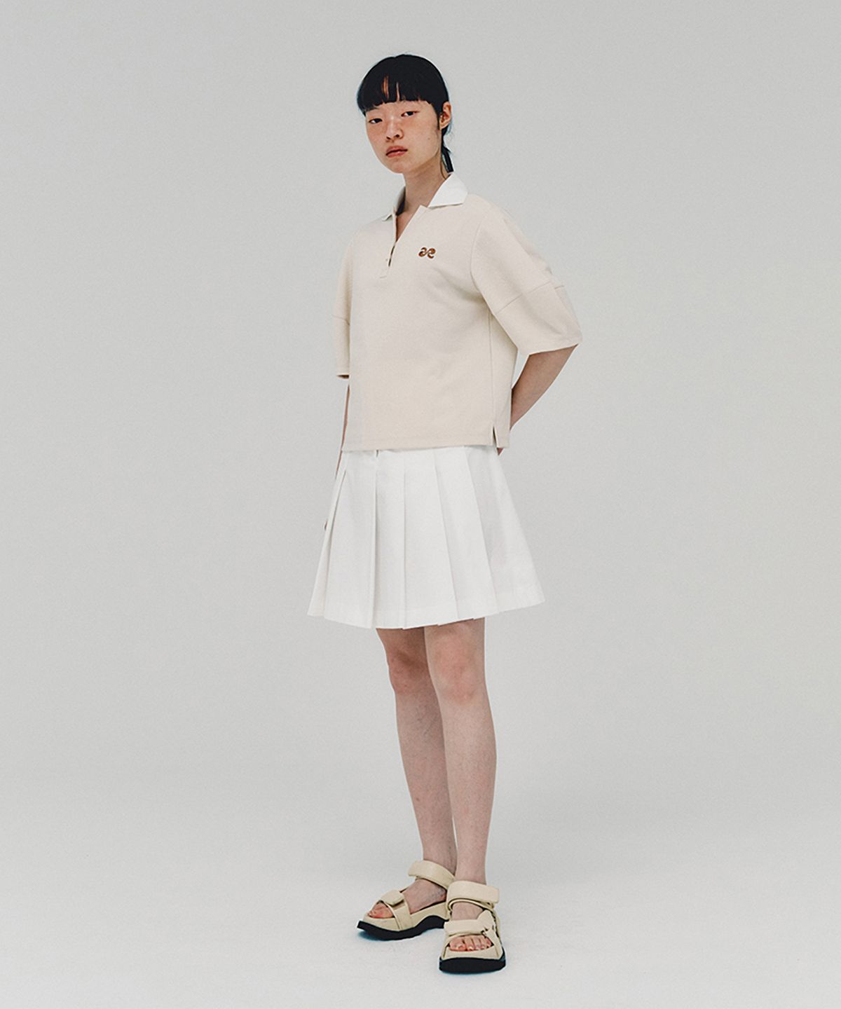 아위(AHWE) Logo Polo Shirt_CREAM