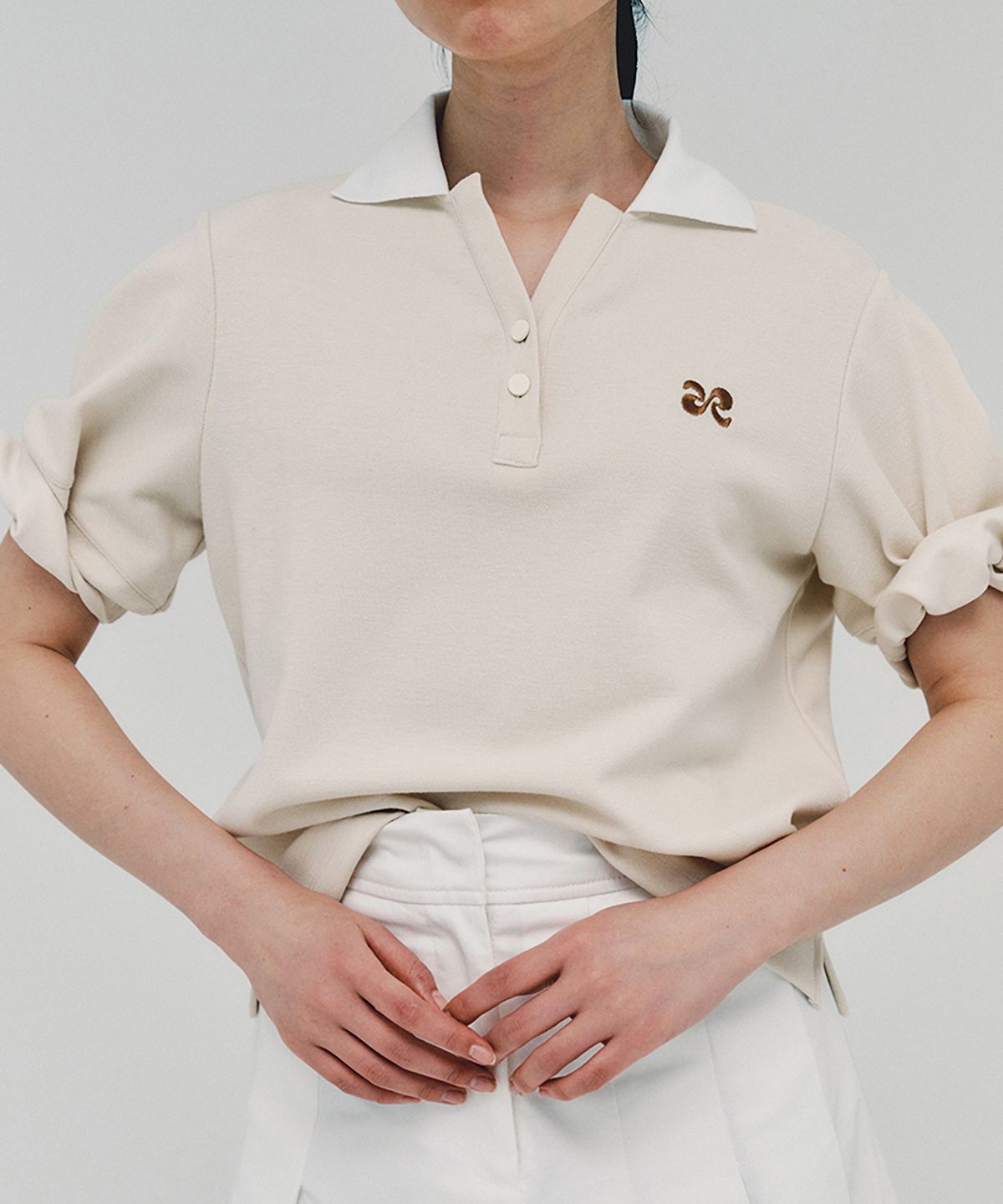 아위(AHWE) Logo Polo Shirt_CREAM