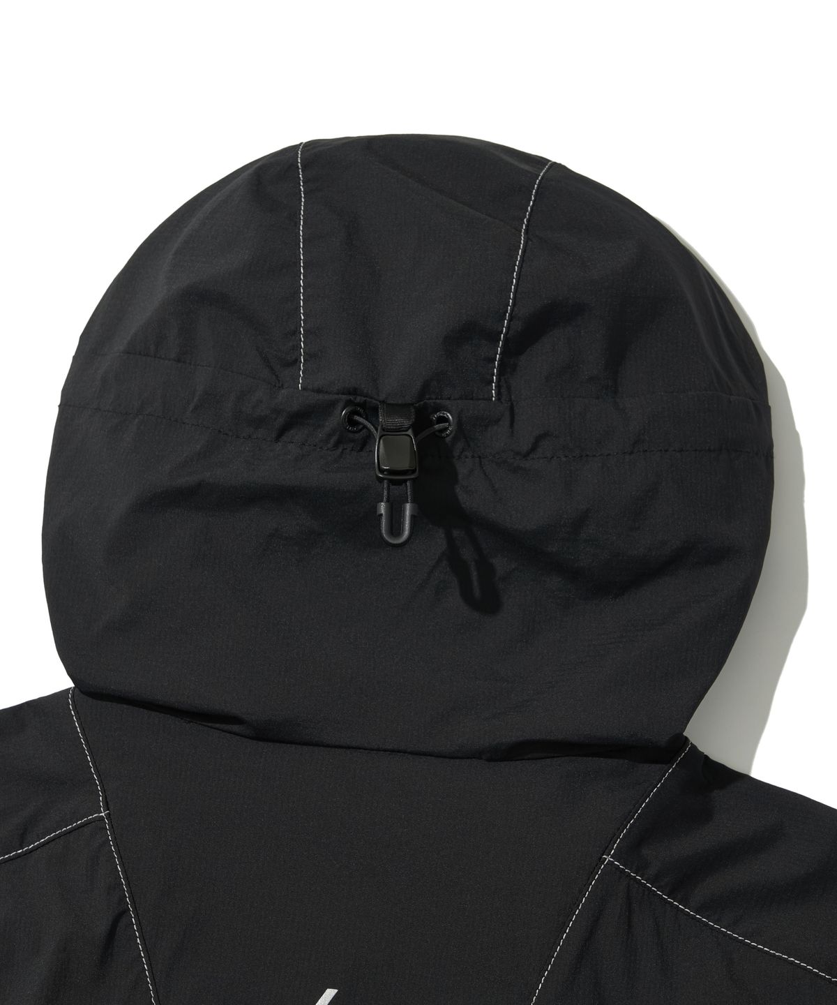 웰터 익스페리먼트(WELTER EXPERIMENT) LIGHT PACKABLE WINDBREAKER_BLACK_WOL058