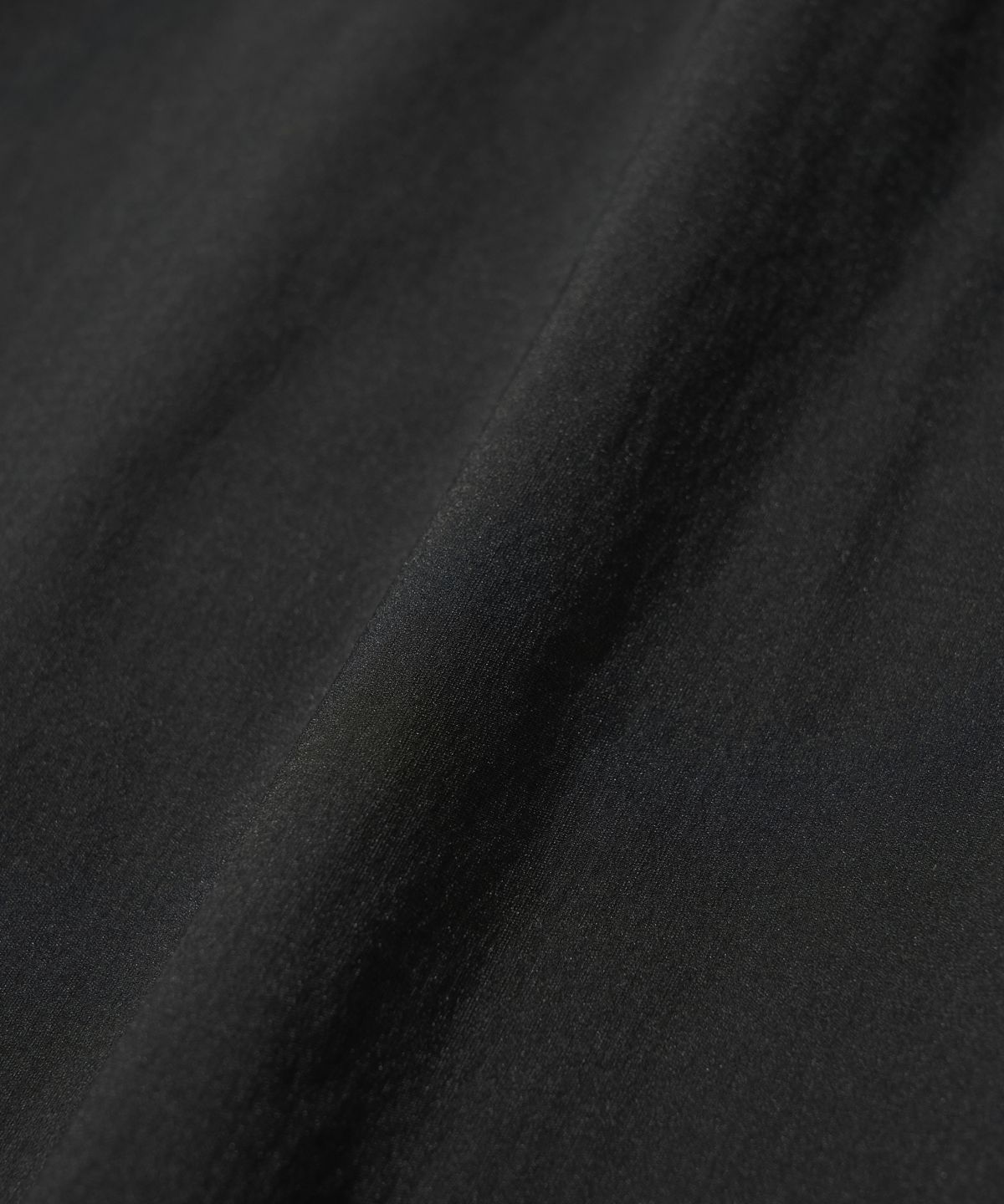 웰터 익스페리먼트(WELTER EXPERIMENT) LIGHT PACKABLE WINDBREAKER_BLACK_WOL058