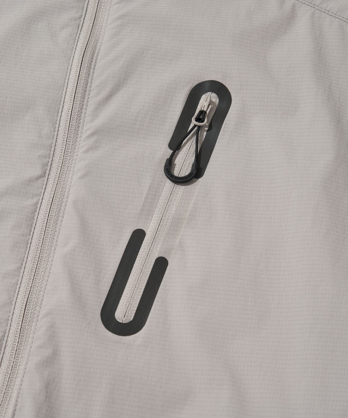 웰터 익스페리먼트(WELTER EXPERIMENT) LIGHT PACKABLE WINDBREAKER_LIGHT GRAY_WOL059