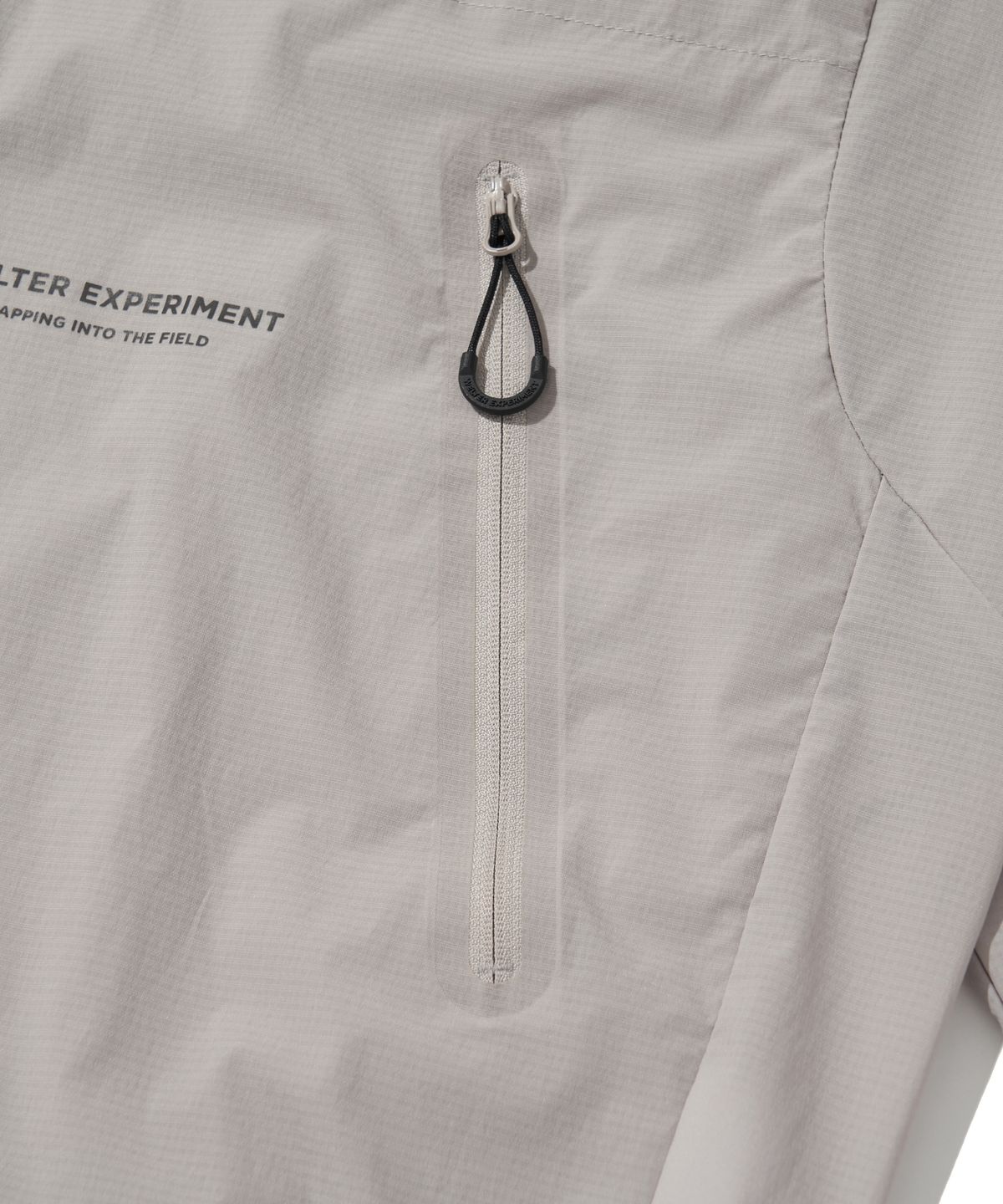 웰터 익스페리먼트(WELTER EXPERIMENT) LIGHT PACKABLE WINDBREAKER_LIGHT GRAY_WOL059
