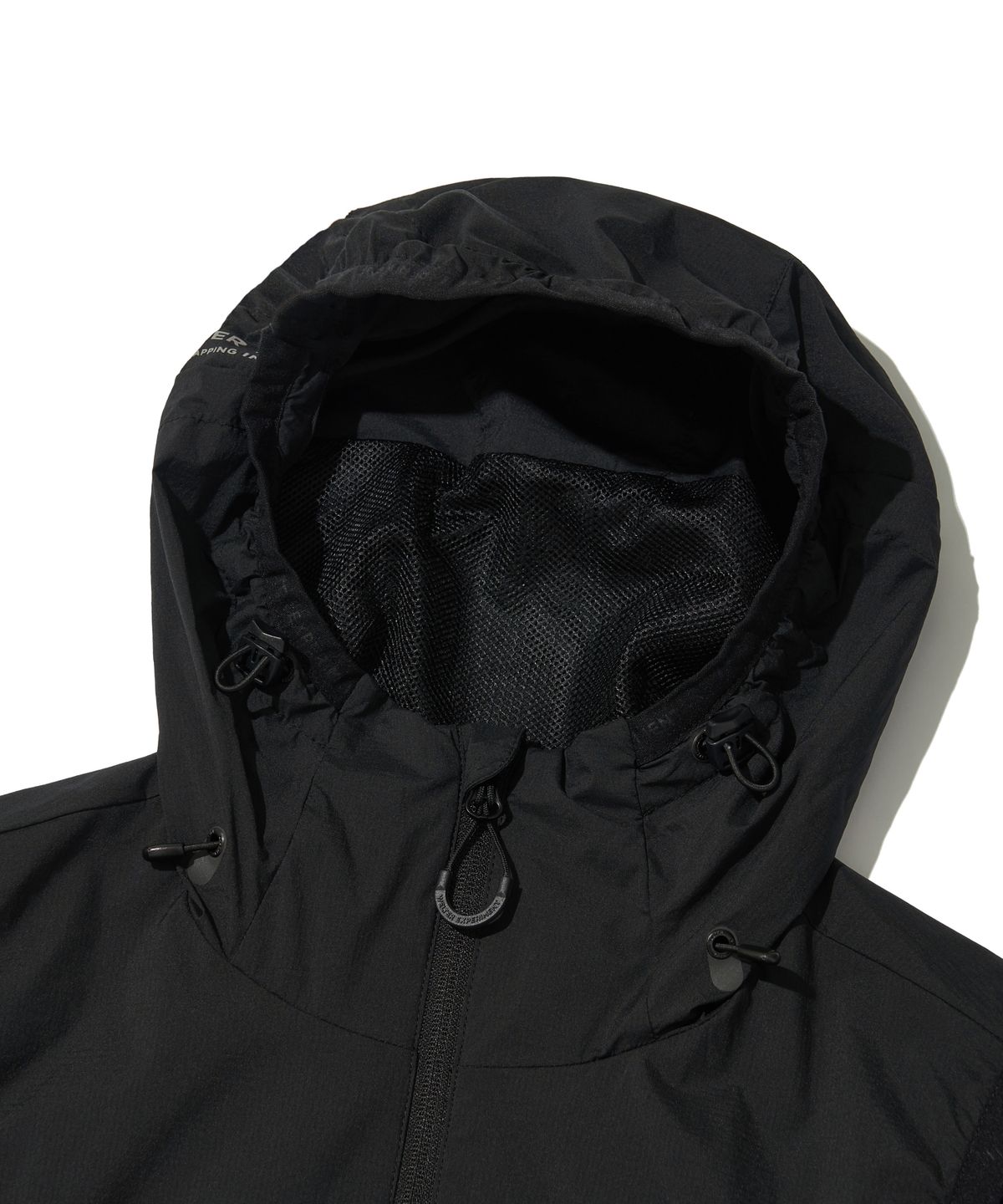 웰터 익스페리먼트(WELTER EXPERIMENT) DETACHABLE LIGHT WINDBREAKER_BLACK_WOL061