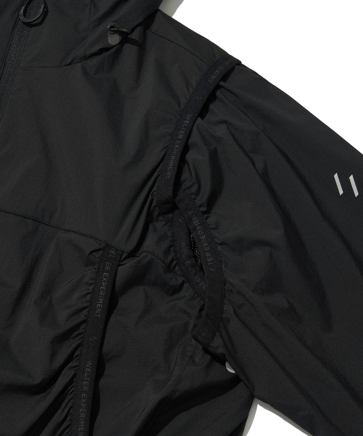 웰터 익스페리먼트(WELTER EXPERIMENT) DETACHABLE LIGHT WINDBREAKER_BLACK_WOL061