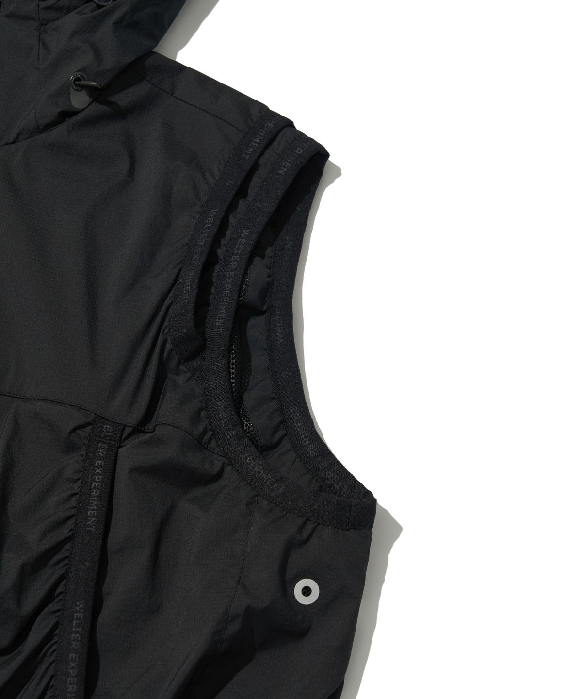 웰터 익스페리먼트(WELTER EXPERIMENT) DETACHABLE LIGHT WINDBREAKER_BLACK_WOL061