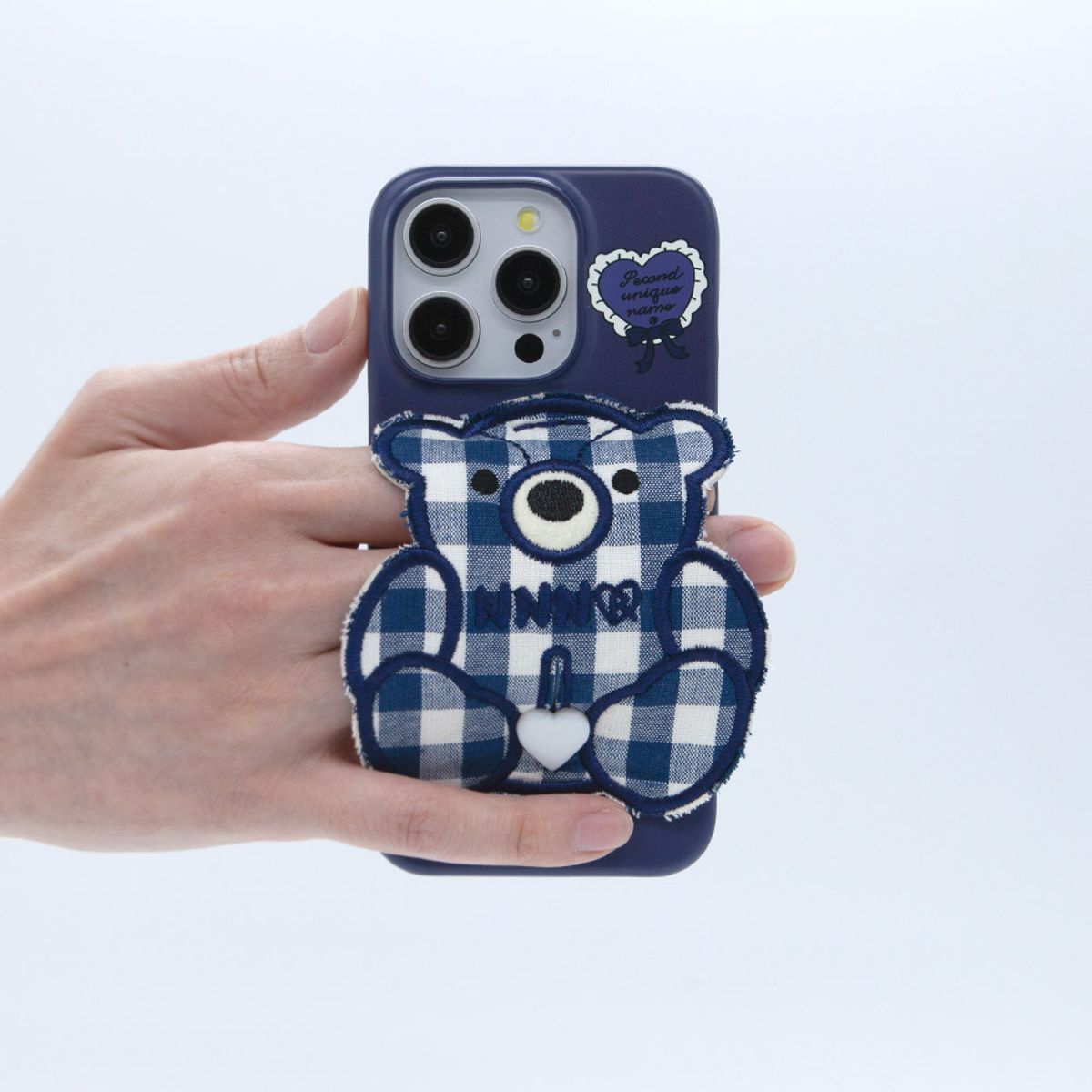 세컨드유니크네임(SECOND UNIQUE NAME) SUN CASE PATCH CHECK BEAR NAVY