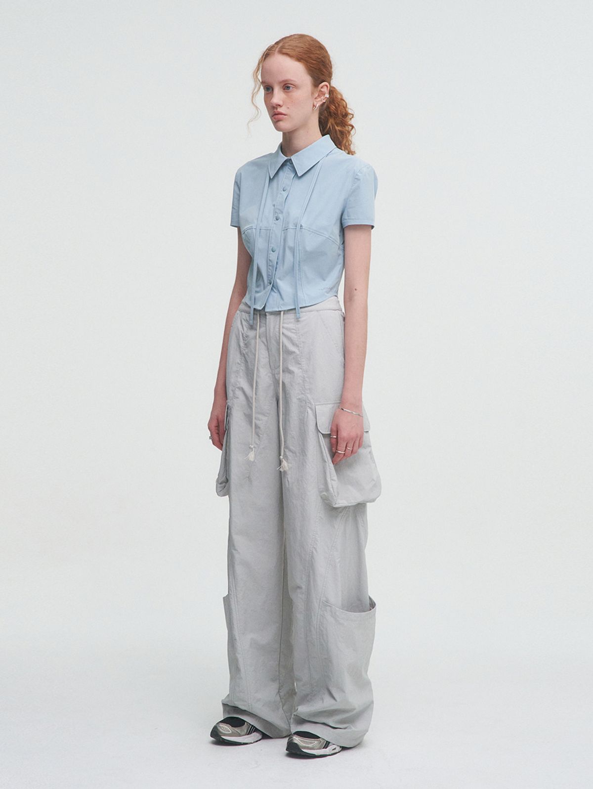 뚜오미오(TUOMIO) LIGHT CARGO TRACKPANTS [LIGHT GREY]