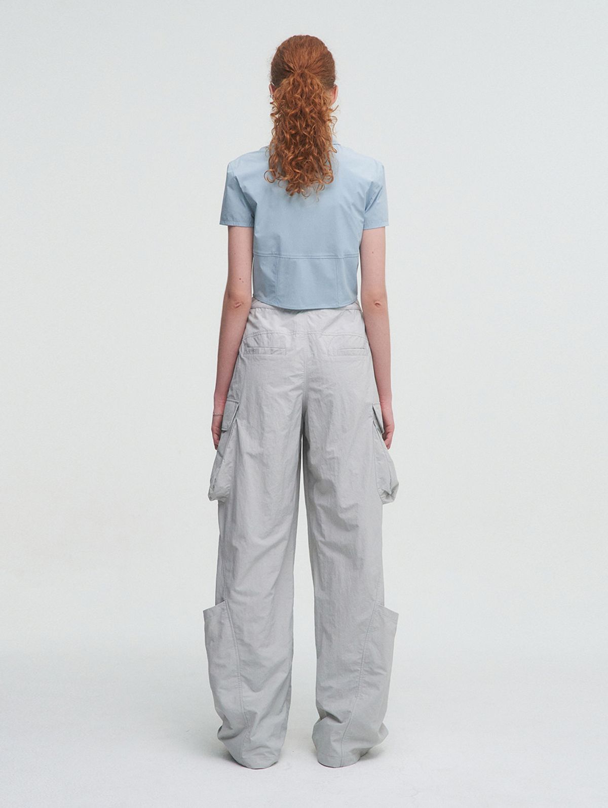 뚜오미오(TUOMIO) LIGHT CARGO TRACKPANTS [LIGHT GREY]