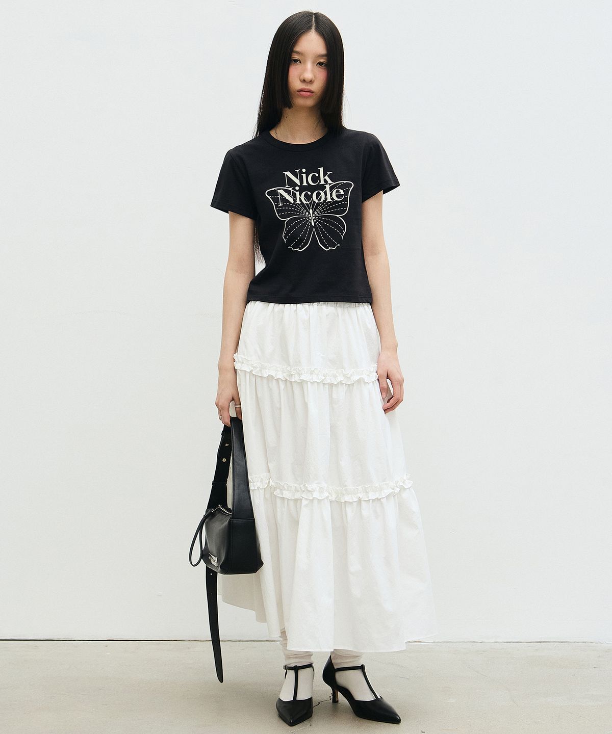 닉앤니콜(NICK&NICOLE) BUTTERFLY SIGNATURE CROP TOP_BLACK CREAM