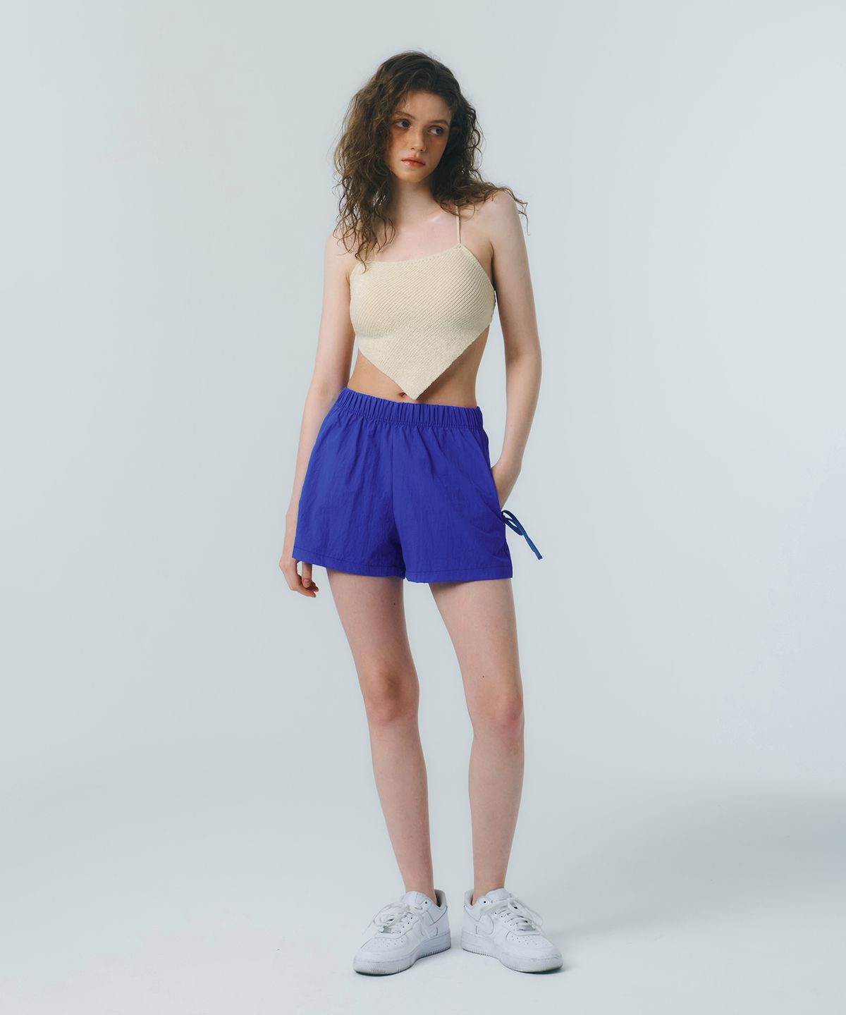 꾸아페(QUAFE) RIBBON NYLON SHORTS_blue