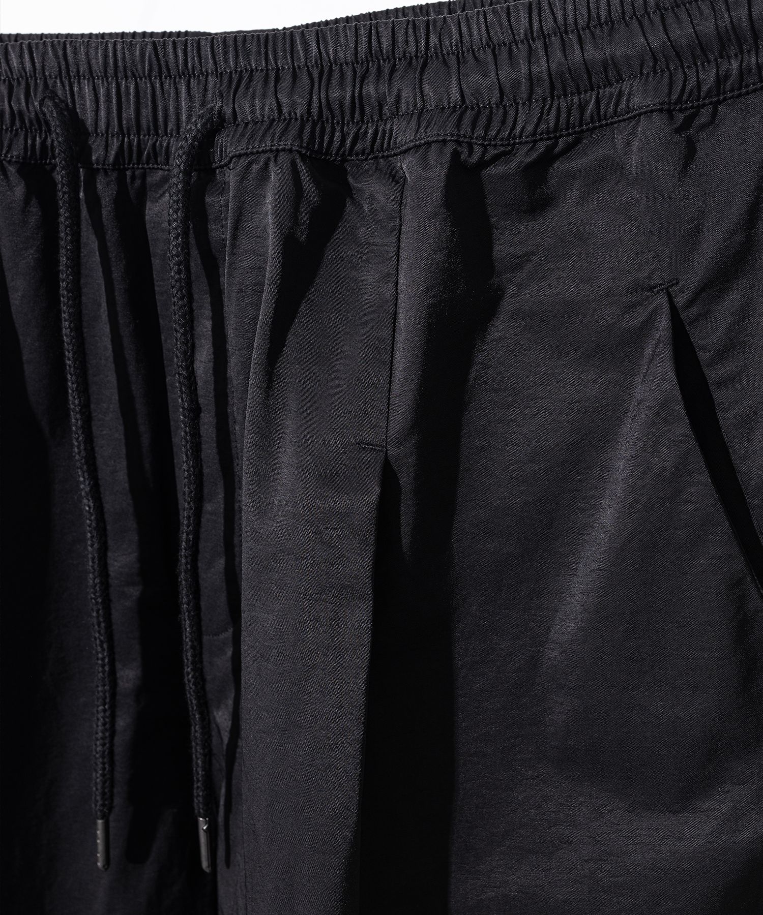 MUSINSA | MASSNOUN Curved One-Tuck Pleats Mesh Track Pants