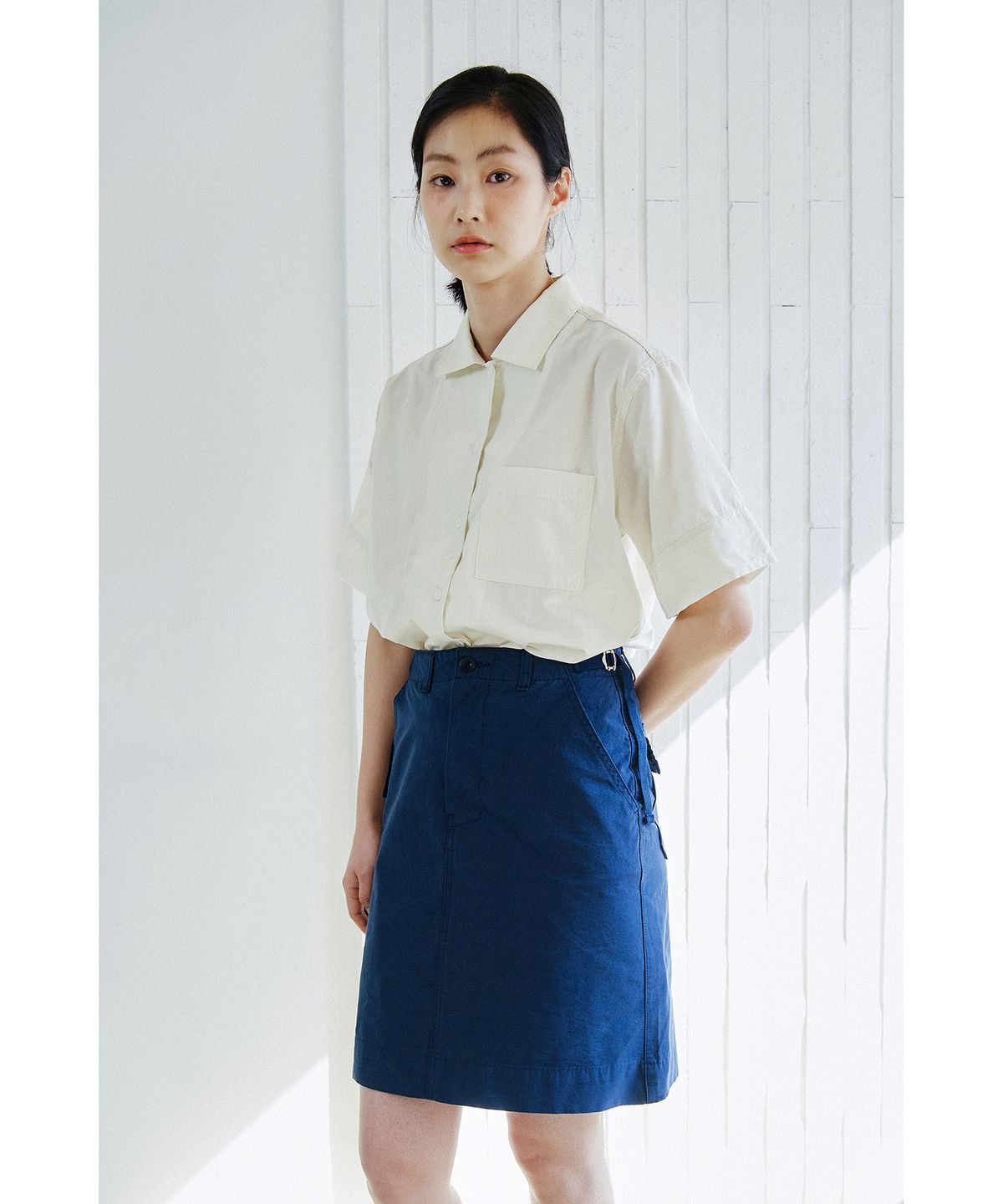 코튼벨(COTTON BELL) 미디 사이드 벨트 스커트 - Navy