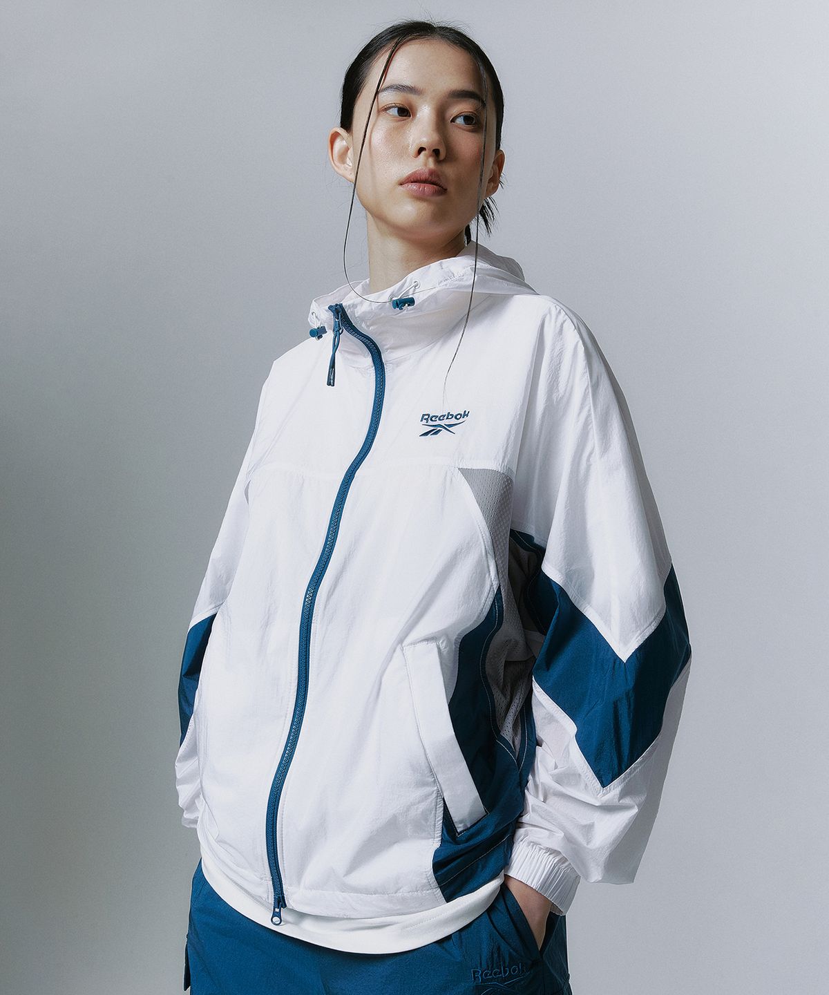 리복(REEBOK) 메쉬 하이브리드 윈드 브레이커 - 화이트:터키쉬 블루