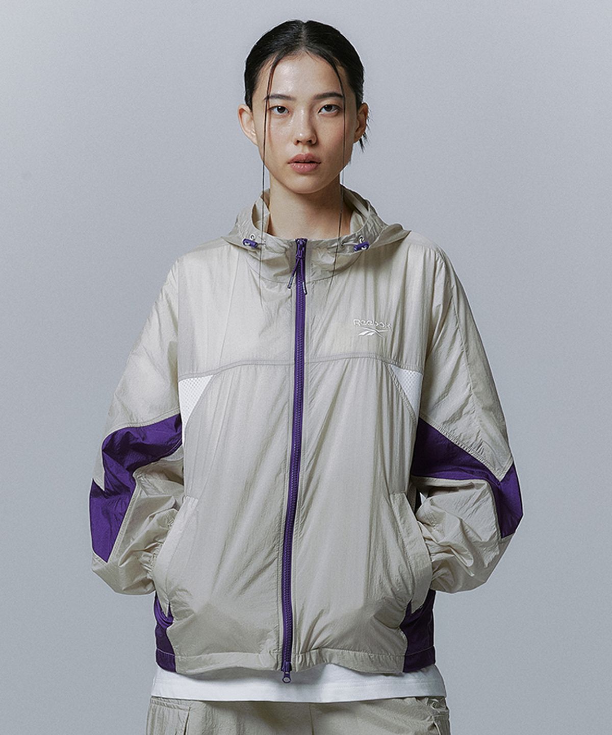 리복(REEBOK) 메쉬 하이브리드 윈드 브레이커 - 베이지