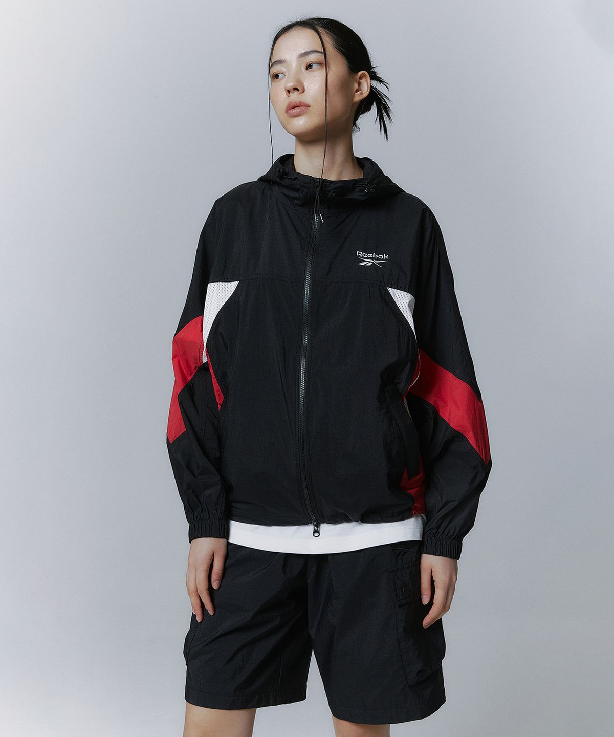 리복(REEBOK) 메쉬 하이브리드 윈드 브레이커 - 블랙