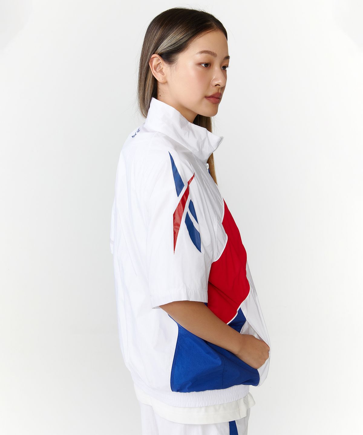 리복(REEBOK) 패널드 벡터 반팔 아노락 - 화이트:터키쉬 블루