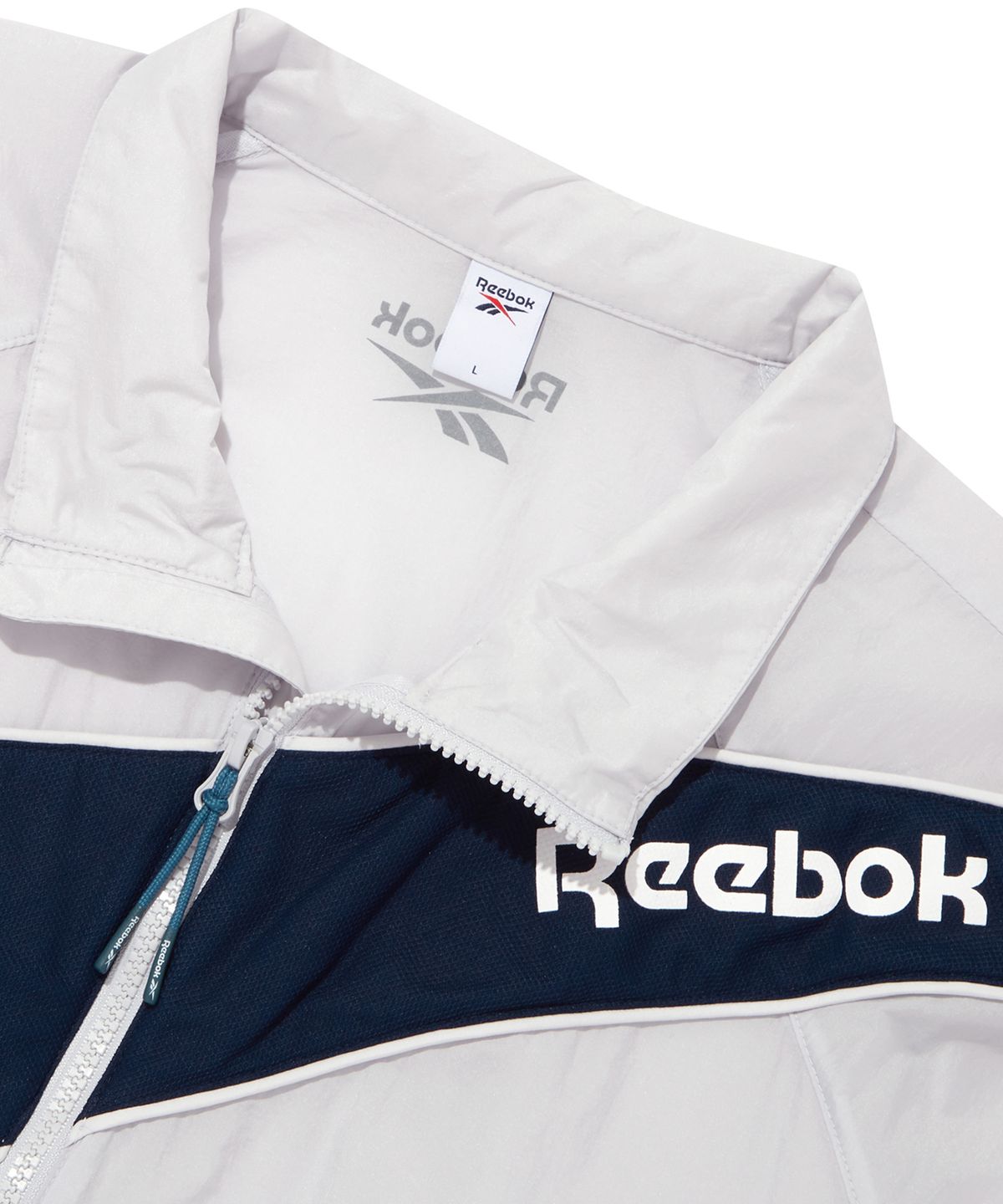 리복(REEBOK) 패널드 벡터 반팔 아노락 - 그레이