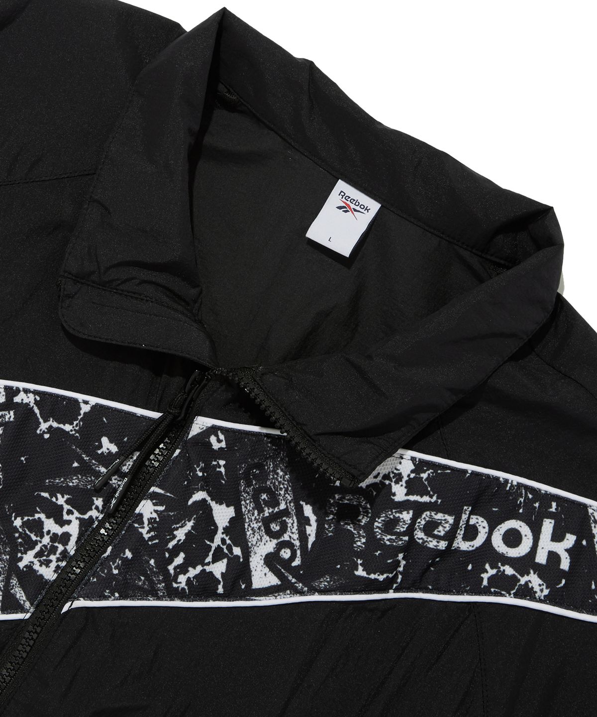 리복(REEBOK) 패널드 벡터 반팔 아노락 - 블랙