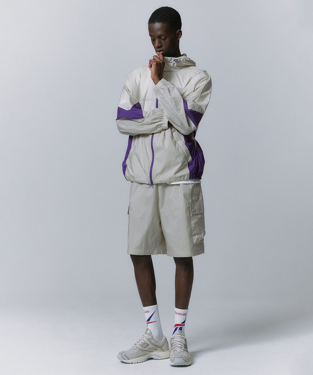 리복(REEBOK) 경량 카고 쇼츠 - 베이지