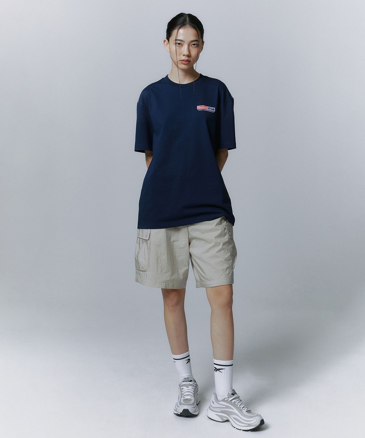 리복(REEBOK) 경량 카고 쇼츠 - 베이지
