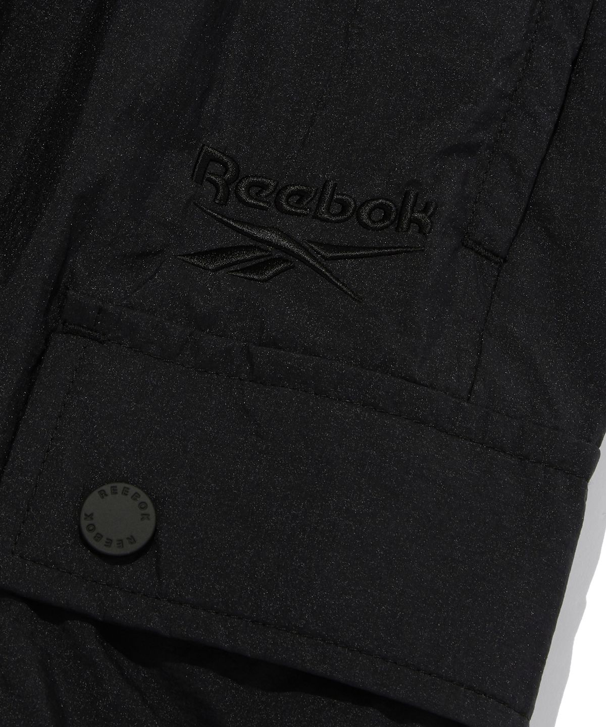 리복(REEBOK) 경량 카고 쇼츠 - 블랙