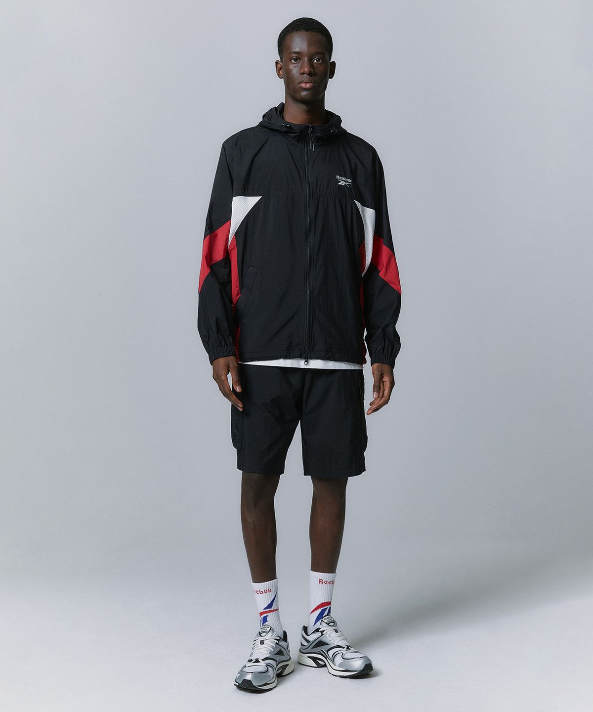 리복(REEBOK) 경량 카고 쇼츠 - 블랙