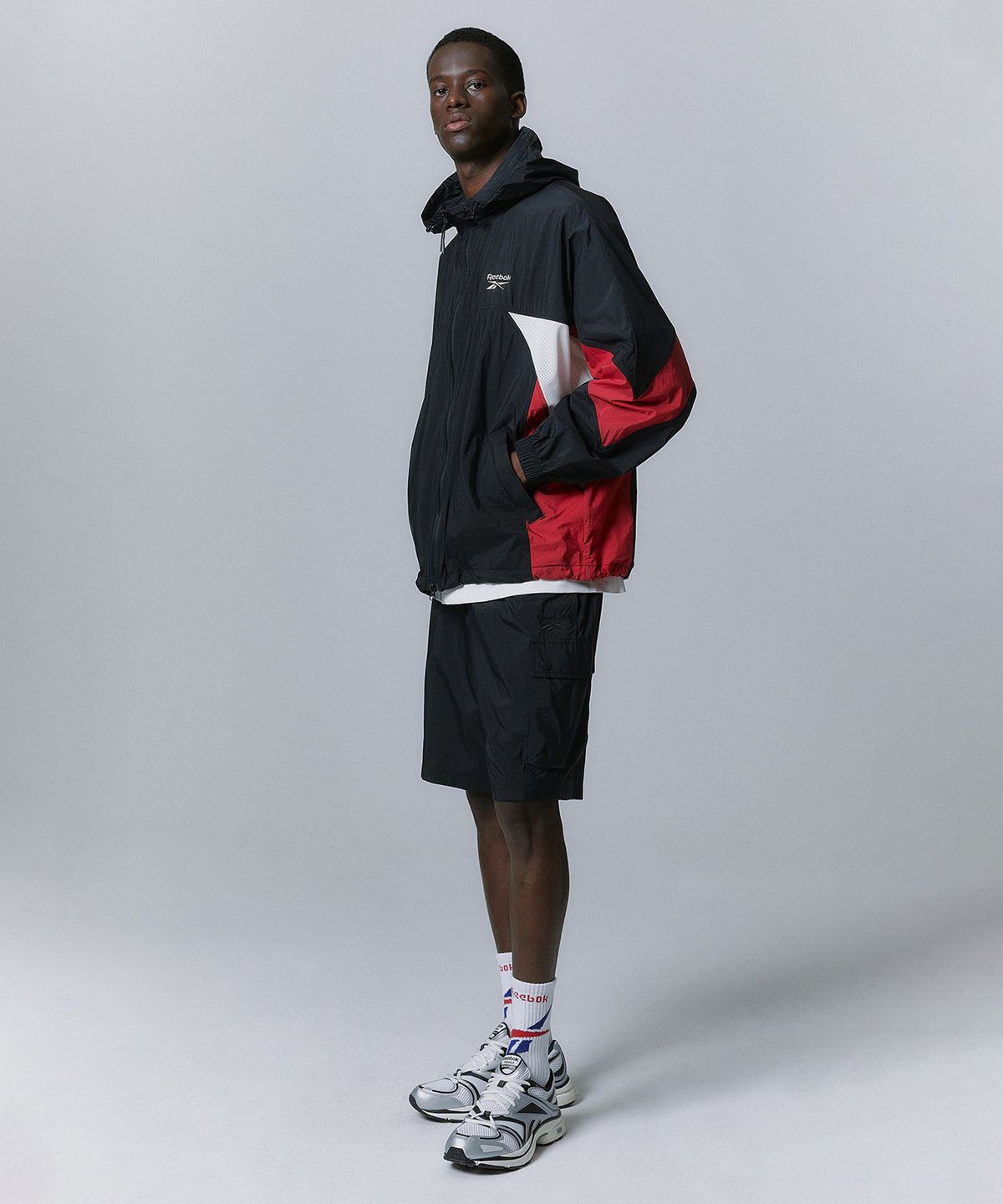 리복(REEBOK) 경량 카고 쇼츠 - 블랙