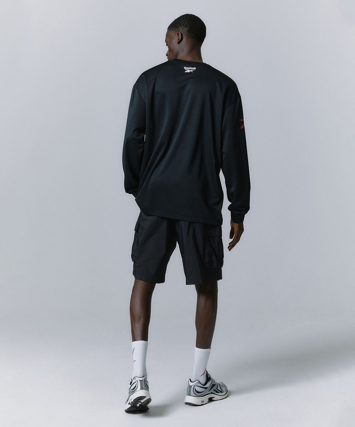 리복(REEBOK) 경량 카고 쇼츠 - 블랙