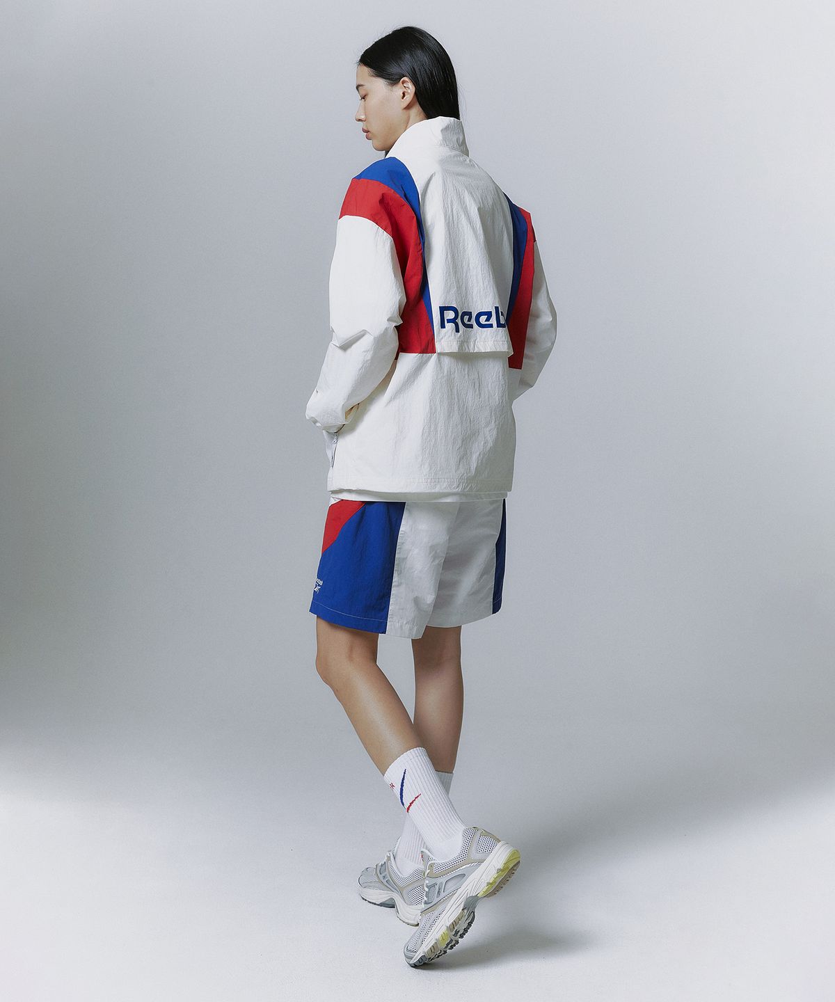 리복(REEBOK) 트윈 벡터 윈드 브레이커 - 오프 화이트