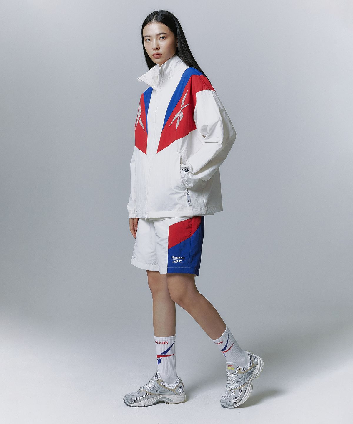 리복(REEBOK) 트윈 벡터 윈드 브레이커 - 오프 화이트